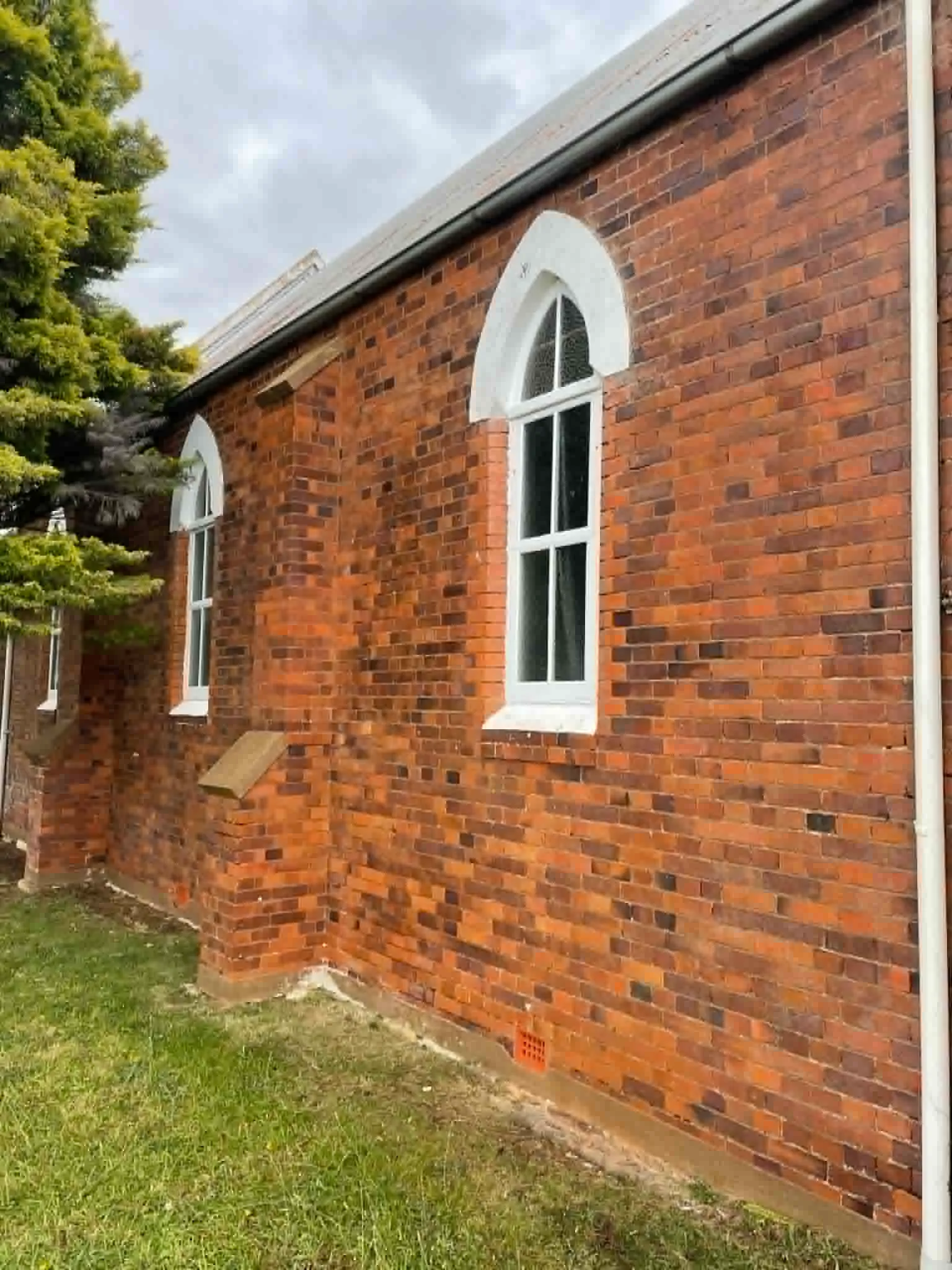 Exterior cleaning of a church and historical building using soft washing and pressure washing